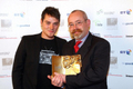 Ian picks up his award from singer Matt Willis